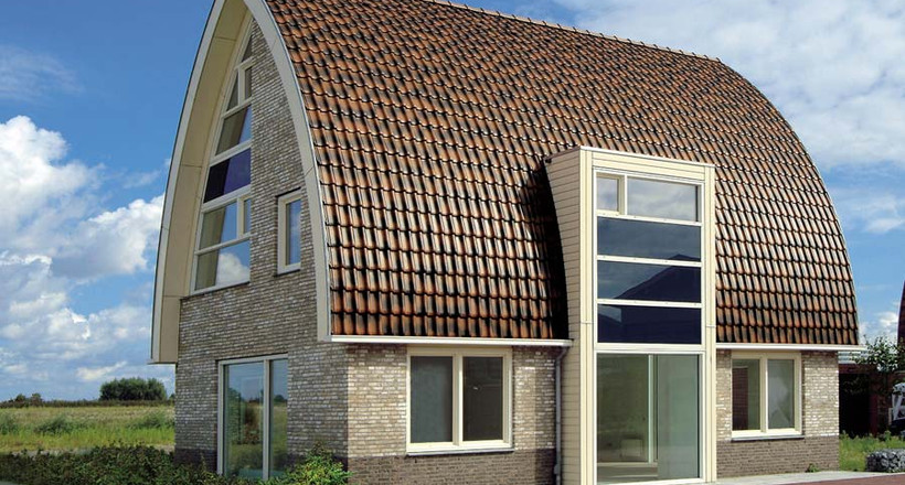 Dom jednorodzinny z dachówki Flandern brązowomiedzianej cieniowanej